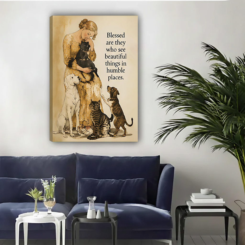 Woman in yellow floral dress holding black cat surrounded by white labrador tabby cat and dachshund vintage watercolor illustration with blessed beautiful things humble places quote gallery wrap canvas art displayed on white wall above navy blue sofa with white side table glass vase and large palm plant