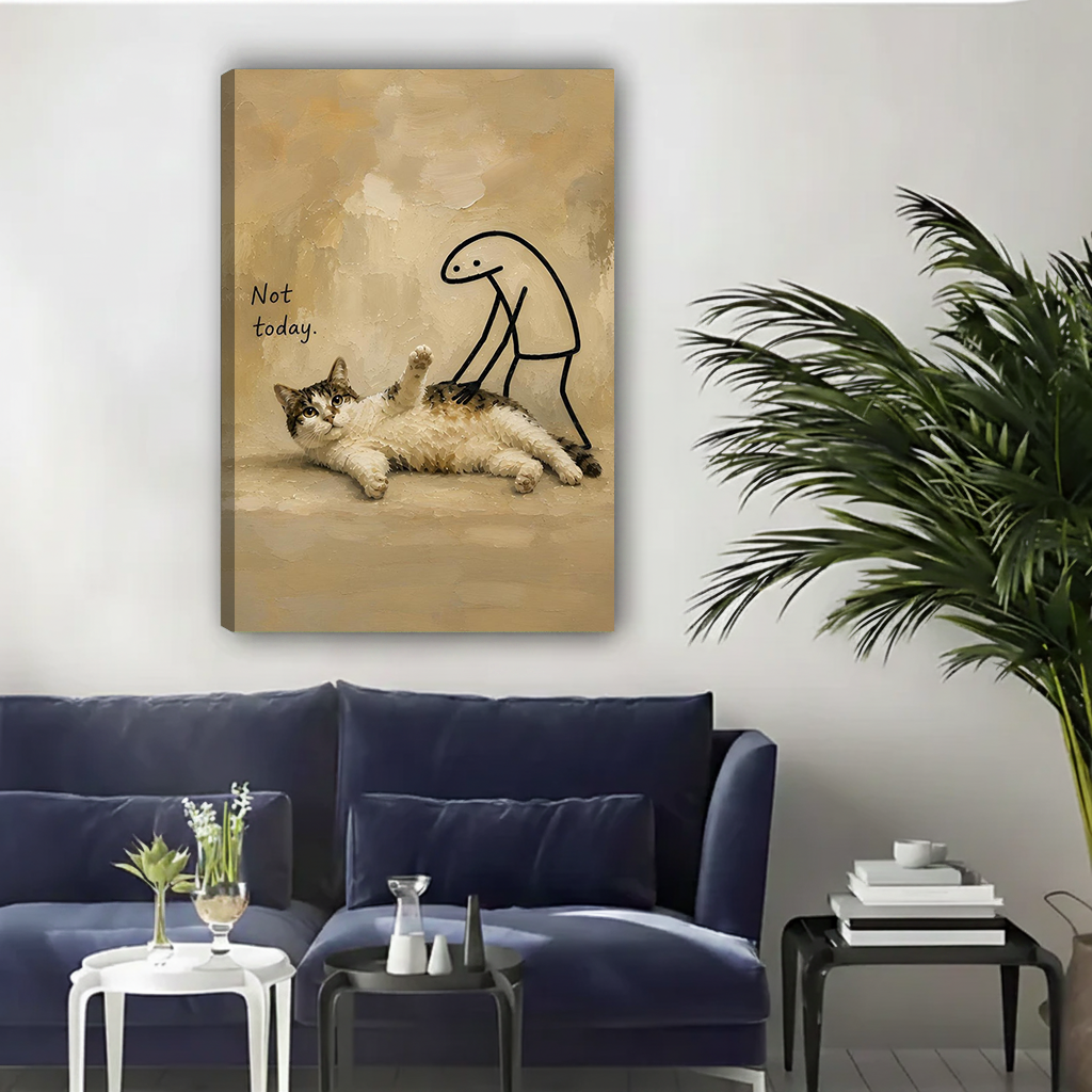 Whimsical cat 'Not Today' canvas wall art displayed above a navy velvet sofa in a contemporary living room
