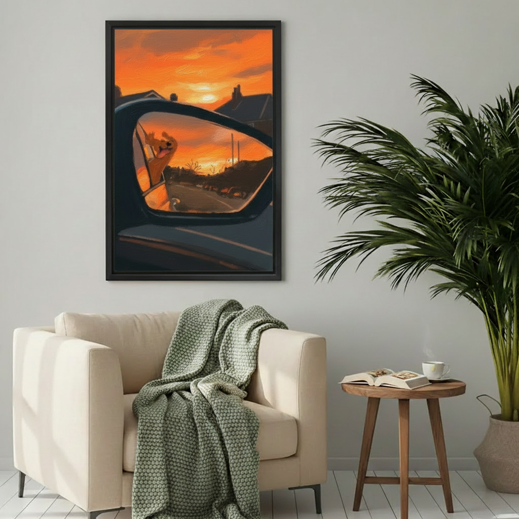Dog rearview mirror sunset canvas wall art in black frame above a cream armchair in a cozy living room