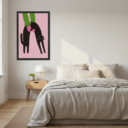 Cute black cat arching back being petted pink background illustration wall art print in black frame above Scandinavian bed with linen bedding and oak nightstand in modern bedroom