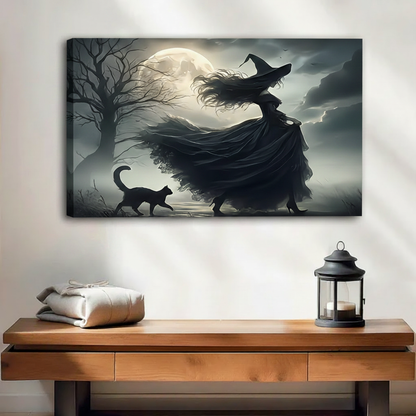 Black cat and witch moonlit night canvas wall art, frameless gallery wrap, dark gothic oil painting style, hung above a rustic wooden console table with lantern in a warm neutral entryway