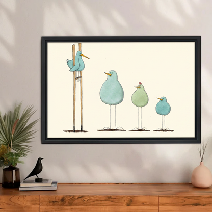Funny blue birds on stilts watercolor illustration wall art print in black frame above walnut sideboard with black bird sculpture and pink ceramic vase in modern living room