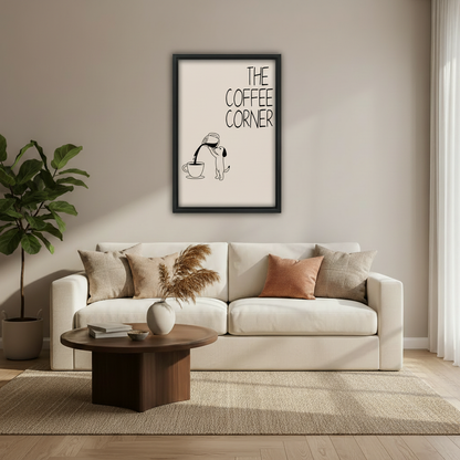 Hilarious dog catching coffee from pot the coffee corner funny line art wall art print in black frame above cream sofa with dark round coffee table pampas grass vase and fiddle leaf fig in modern living room