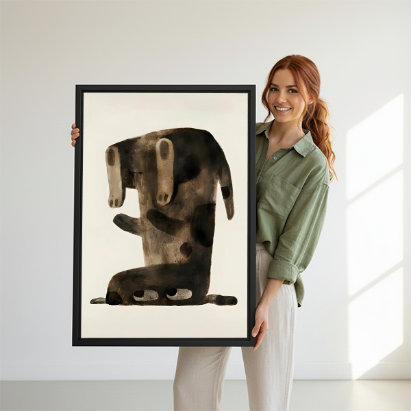 Woman holding large minimalist dachshund abstract framed canvas print showing size reference against white studio background