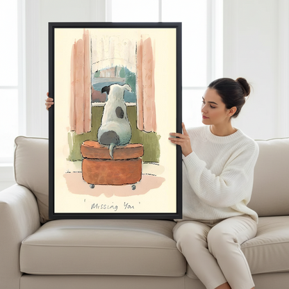 Woman holding large Missing You framed dog watercolor print to show size on white sofa