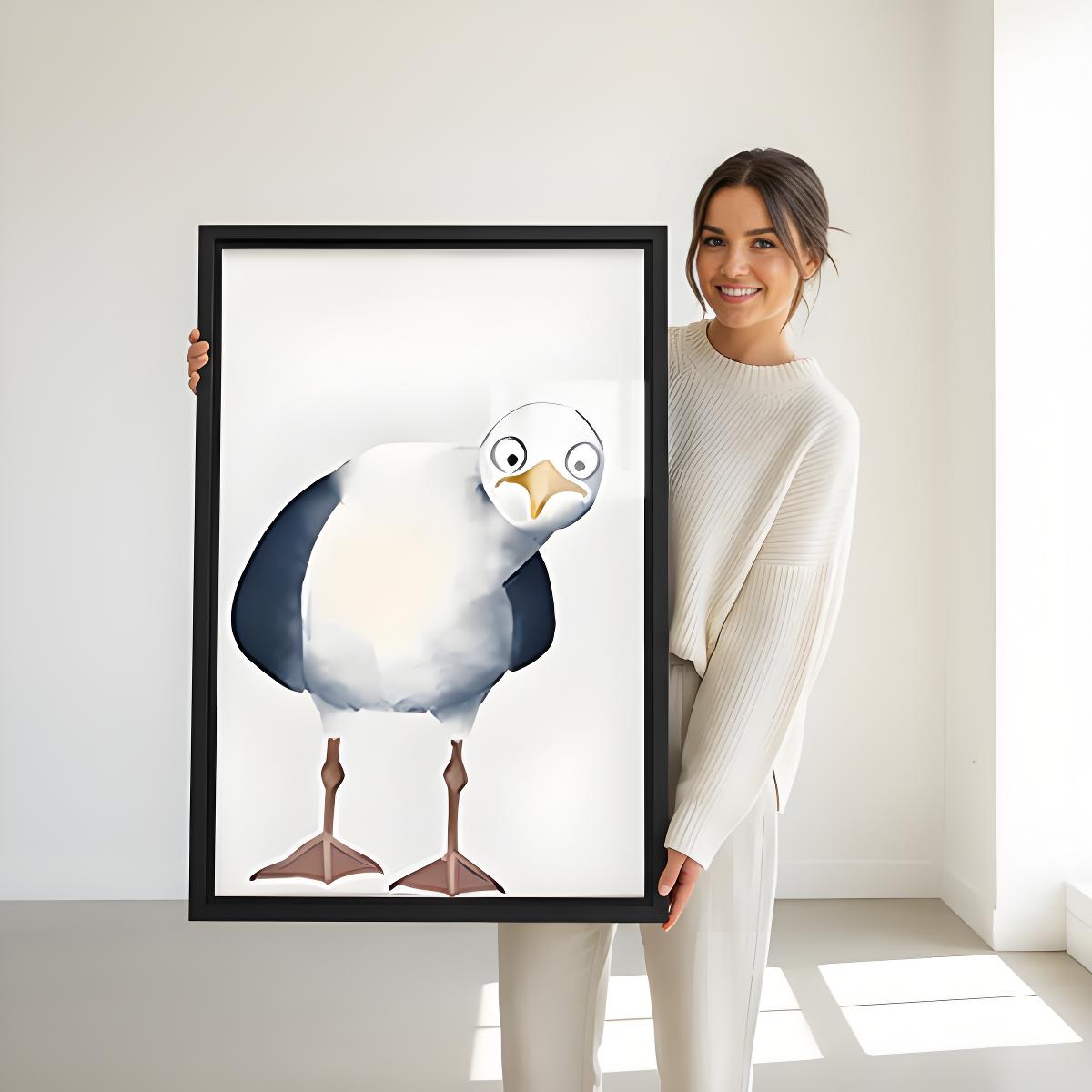 Woman holding large framed seagull art print, oversized funny bird wall art poster for coastal or beach-themed room decor