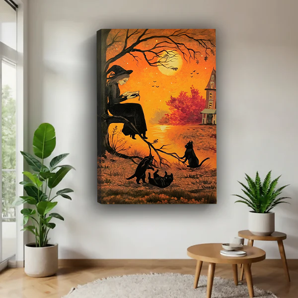Framed gothic Halloween witch canvas wall art above a console, featuring a reading witch beneath an amber moon