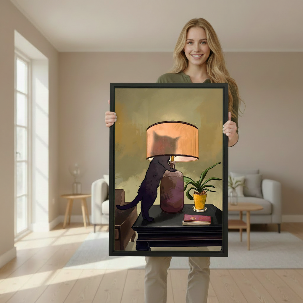 Woman holding large vintage black cat lamp framed print in bright Scandinavian style interior