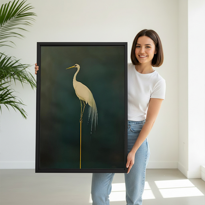 Woman holding elegant white egret minimalist framed canvas wall art, large size dark green bird print for home decor
