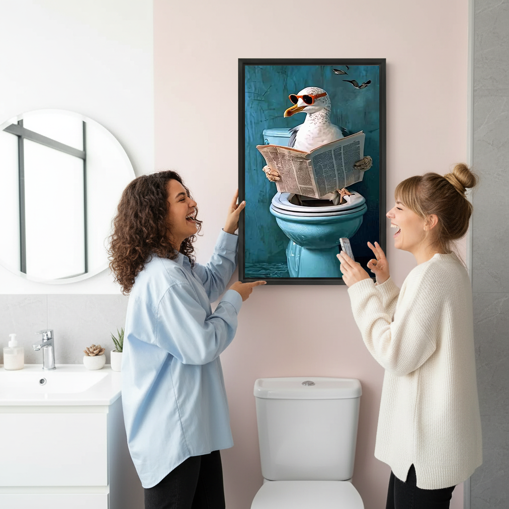 Two women laughing holding funny seagull newspaper toilet framed canvas print – humorous bathroom wall art gift