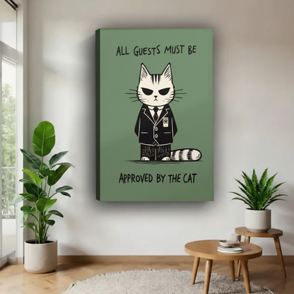 Grumpy cat in black suit approved by the cat funny sage green illustration float frame canvas wall art above cream armchair with green knit throw and round wood side table in contemporary living room