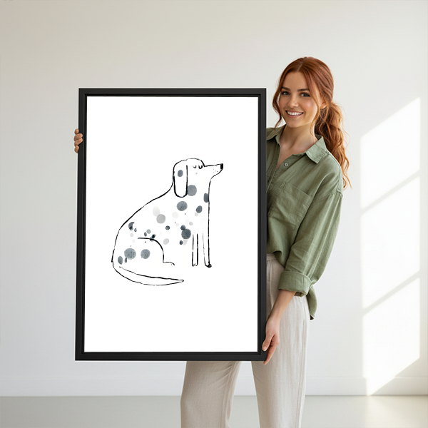 Woman holding large minimalist dalmatian framed wall art print with grey watercolor spots on white background