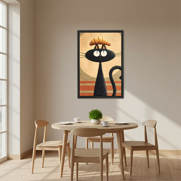 Black cat with croissant retro illustration framed print above round dining table in Scandinavian dining room