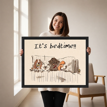 Woman holding large It's Bedtime dogs in bed funny whimsical framed canvas print showing size reference in bright studio with wooden chair