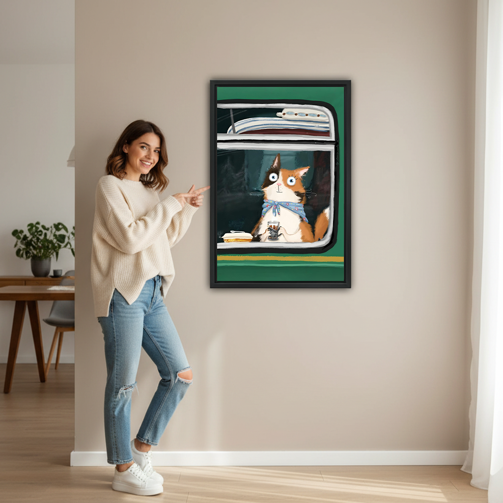 Woman pointing at a large framed cat on train wall art print featuring an orange cat with blue scarf and tea