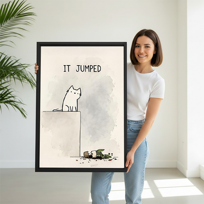 Smiling woman holding large funny cat It Jumped minimalist line art framed canvas print to show size in bright white room with palm plant