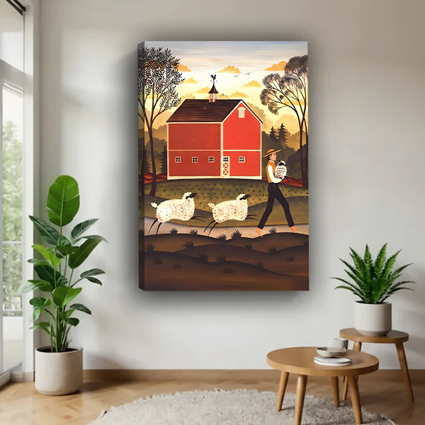 Framed red barn and sheep canvas wall art hanging between potted plants in a bright room.