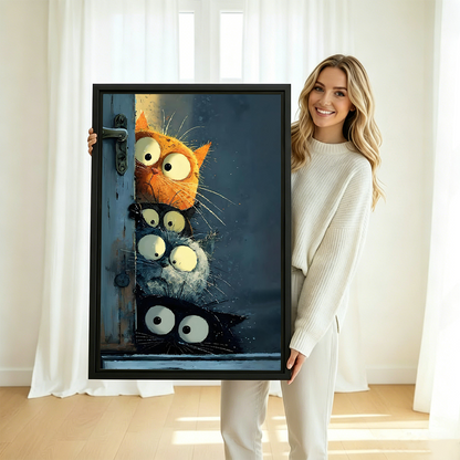 Smiling blonde woman in cream knit sweater holding large four cats peeking door funny whimsical oil painting framed canvas print with orange black grey and black cats stacked around vintage blue door in bright white room with sheer curtains and natural light