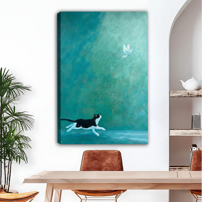 Black and white cat running after white dove canvas wall art, frameless gallery wrap, teal oil painting style, hung above a wooden dining table in a bright boho dining room with palm plant