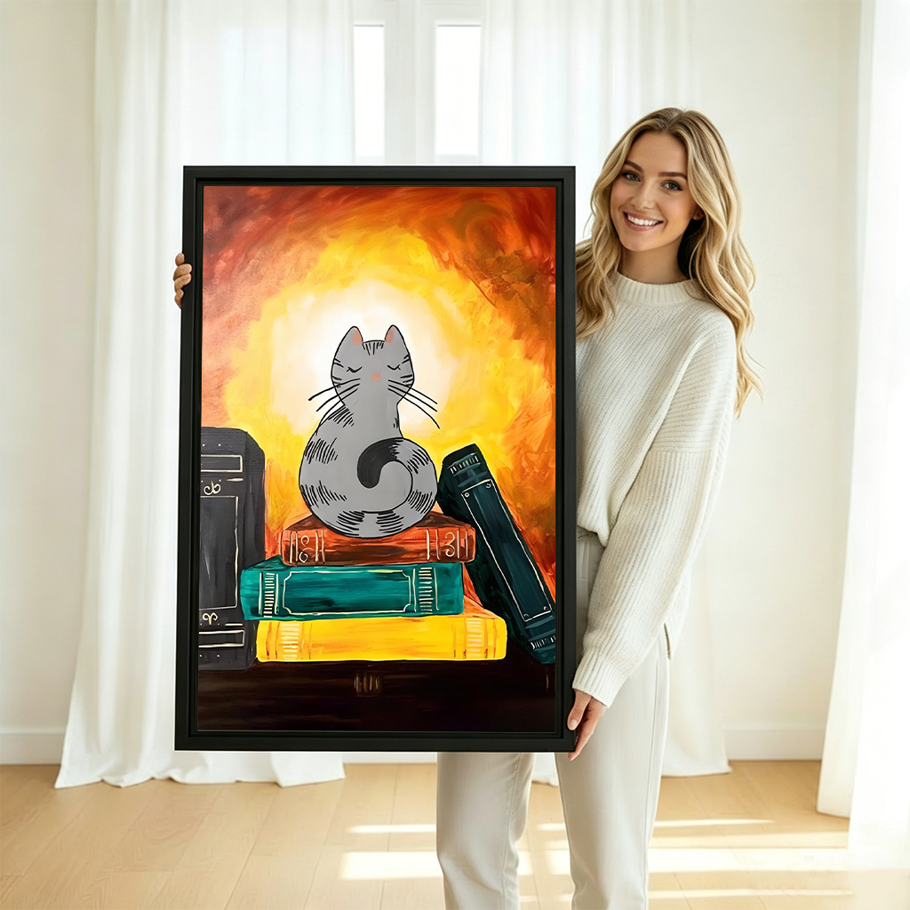 Woman holding large framed canvas print of zen cat on colorful books fiery orange glow mystical illustration wall art