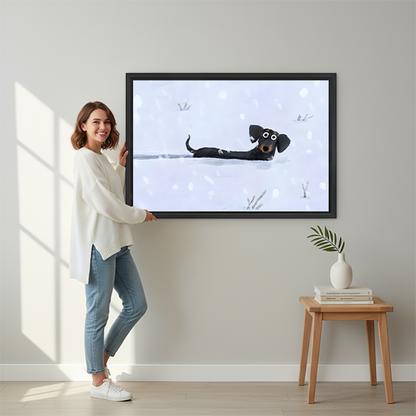 Woman holding large Snow Day dachshund framed canvas print featuring cartoon black dog lying in snow