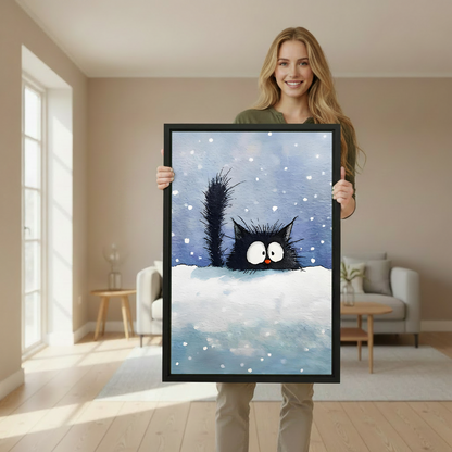 Woman holding large whimsical black cat framed print in bright Scandinavian style interior