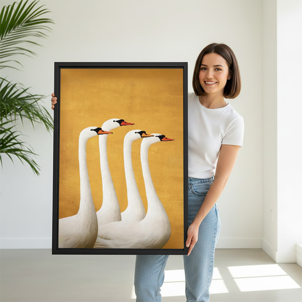 Woman holding elegant swan quartet golden framed canvas wall art, large size luxury white swan print for home decor