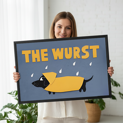 Woman holding The Wurst dachshund framed wall art print featuring black dog in yellow raincoat