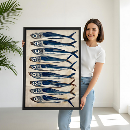 Woman holding Mediterranean sardines fish framed art print – size reference coastal wall decor