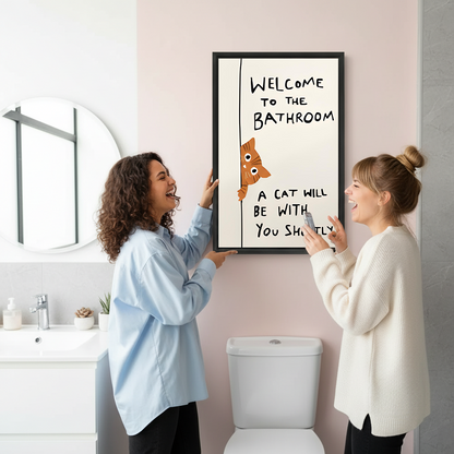 Two women laughing holding funny cat welcome bathroom framed canvas print – humorous cat wall art gift