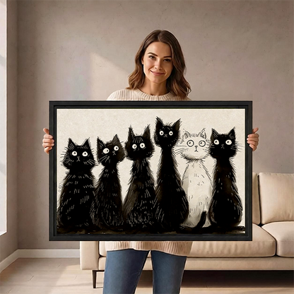Woman holding large framed black and white cats sketch wall art print size reference