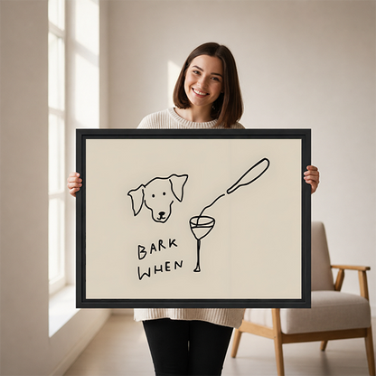 Smiling woman holding large funny dog Bark When wine minimalist framed canvas print to show size in bright room with armchair