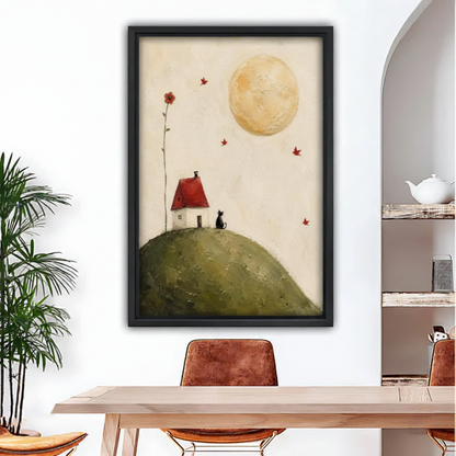 Whimsical black cat moon framed canvas wall art in dining room, folk art print with red-roof cottage on green hill under golden moon
