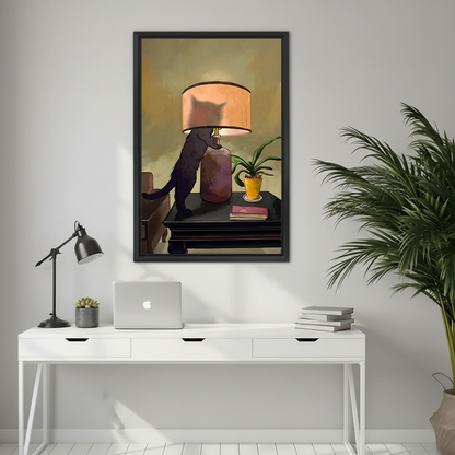 Moody black cat lamp wall art in black frame above white desk in modern home office