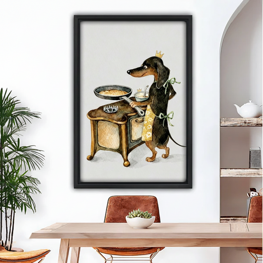 Royal dachshund cooking watercolor canvas wall art in black frame above wooden dining table in bright modern dining room