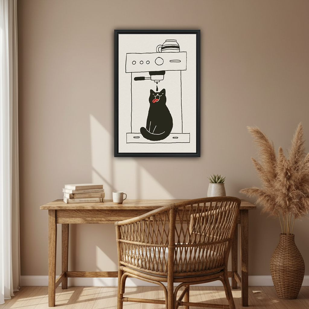Funny black cat sitting under espresso machine with tongue out catching coffee drip minimalist line art illustration framed wall art hung on warm beige wall above rustic wooden desk with stacked books white mug rattan chair succulent and large pampas grass vase in boho home office