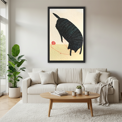 Zen black cat playing with red yarn framed wall art in black frame above cream sofa with round coffee table in modern living room