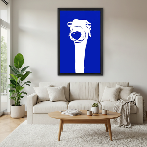 Greyhound bold blue minimalist framed canvas wall art above cream sofa in bright Scandinavian living room with round coffee table and throw blanket