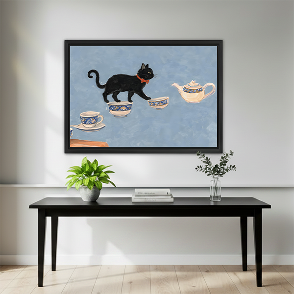 Black cat tea party framed print above minimalist black bench in modern living room