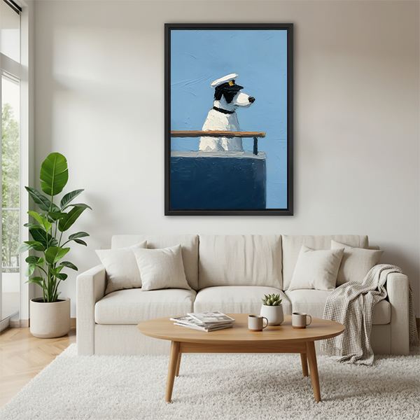 Captain dog framed wall art print displayed above a white sofa in a coastal-style living room

