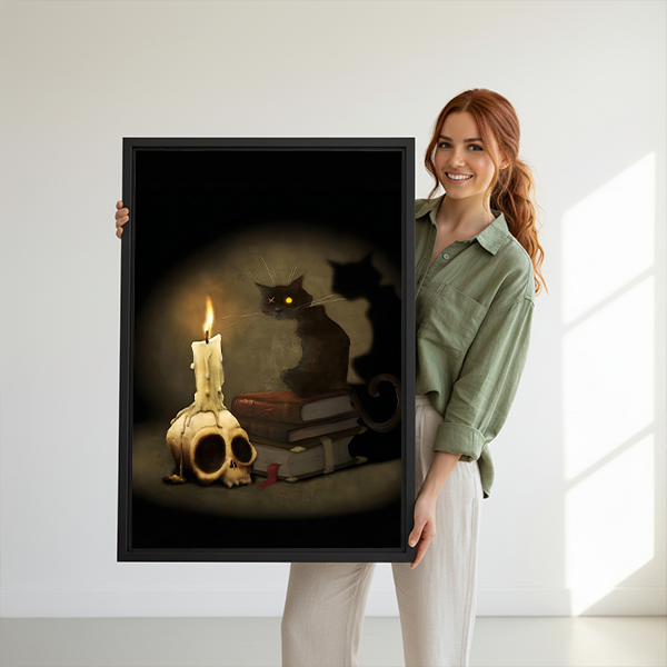 Gothic black cat canvas wall art in a black frame beside a bed with rust bedding and a woven headboard.