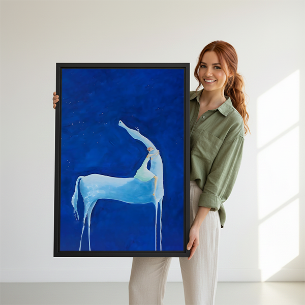 Woman holding large mystical blue deer wall art print size reference