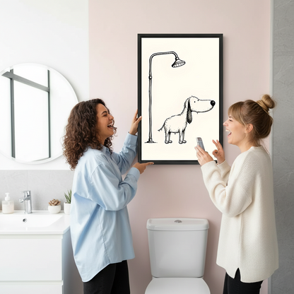Whimsical dog shower canvas wall art in a black frame above a toilet against gray marble bathroom walls.