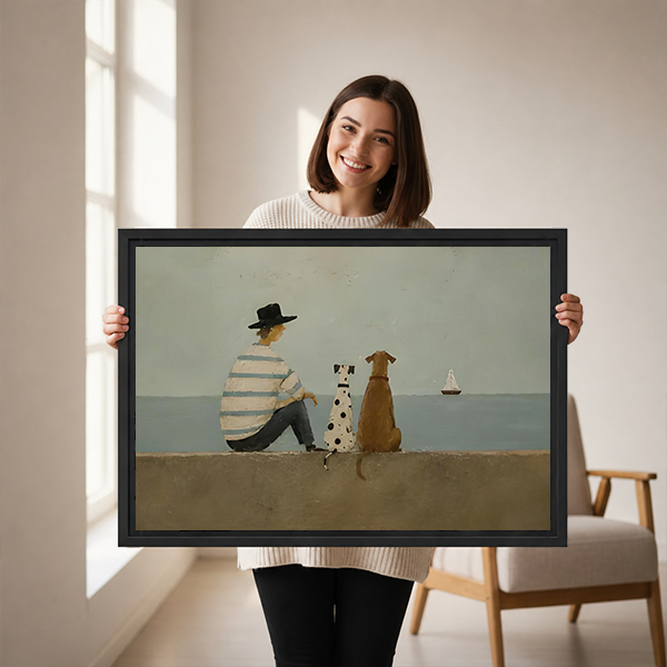 Minimalist seaside dogs canvas wall art in a black frame above a cream sofa with wooden arms.