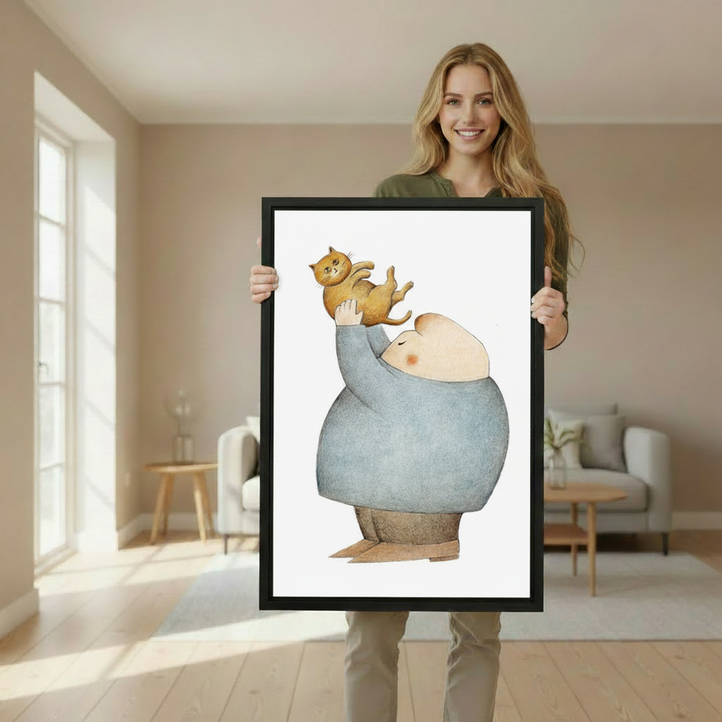 Whimsical Fat Man and Cat Framed Canvas Wall Art – held by woman showing print size in bright living room