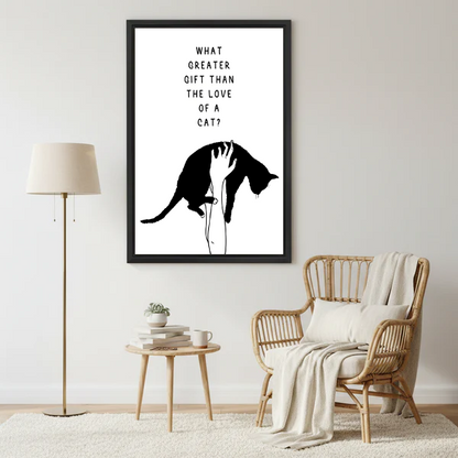 What greater gift than the love of a cat minimalist cat quote framed wall art hung on white wall beside rattan armchair with cream throw blanket round side table and gold floor lamp
