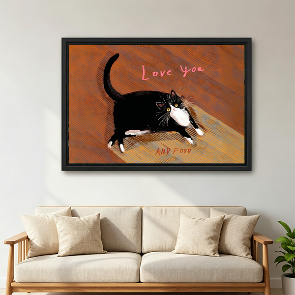 Funny black and white cat Love You and Food framed wall art in black frame above cream sofa with wooden frame in cozy living room