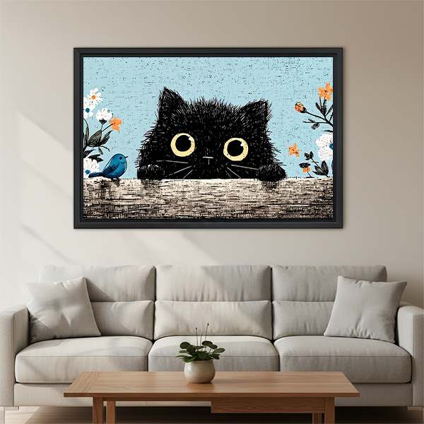 Fluffy black cat peeking over wall vintage floral framed wall art with blue bird and orange flowers hung on beige wall above cream three-seat sofa with wooden coffee table