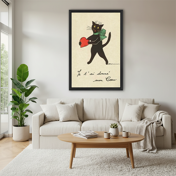 French vintage black cat holding a heart framed print above a cream sofa in a Scandinavian living room, romantic whimsical wall art decor