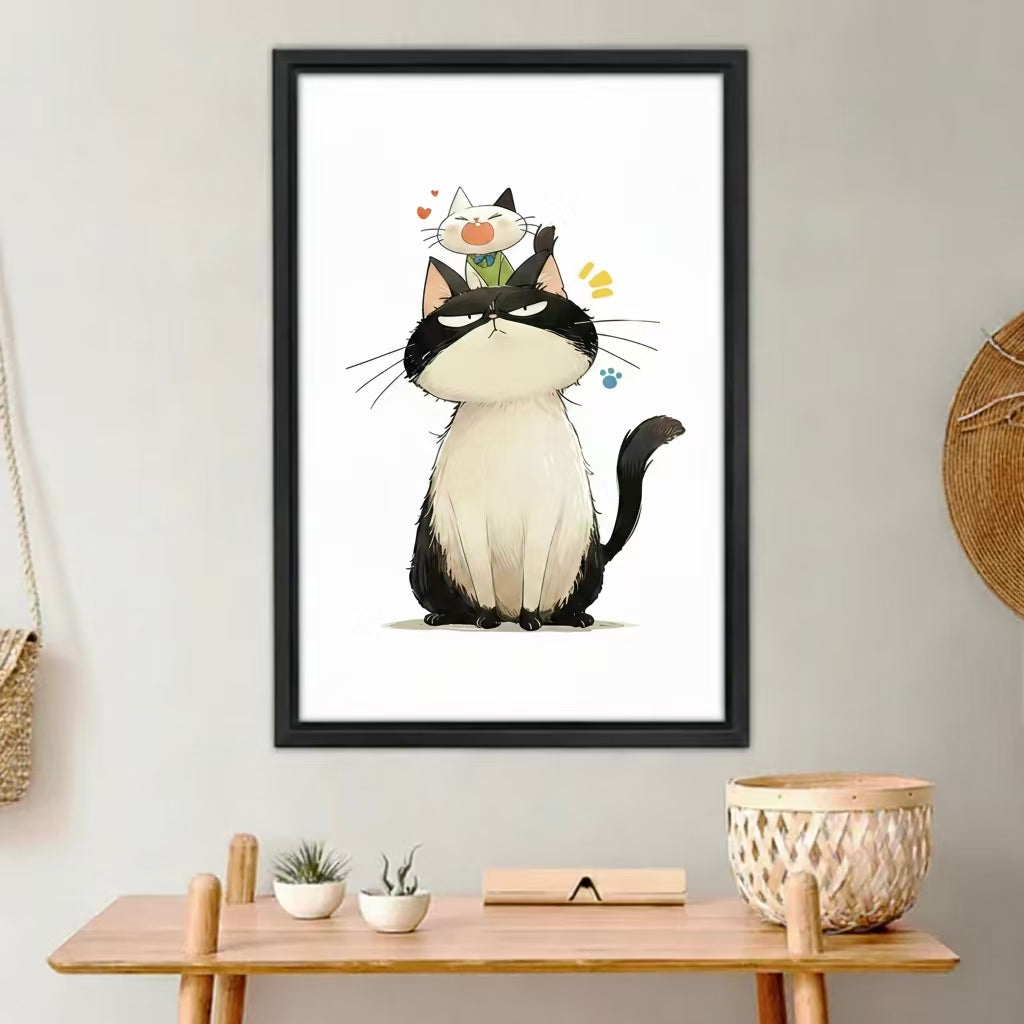 Grumpy cat and kitten funny wall art print in black frame above wooden desk, cute Japanese-style illustration